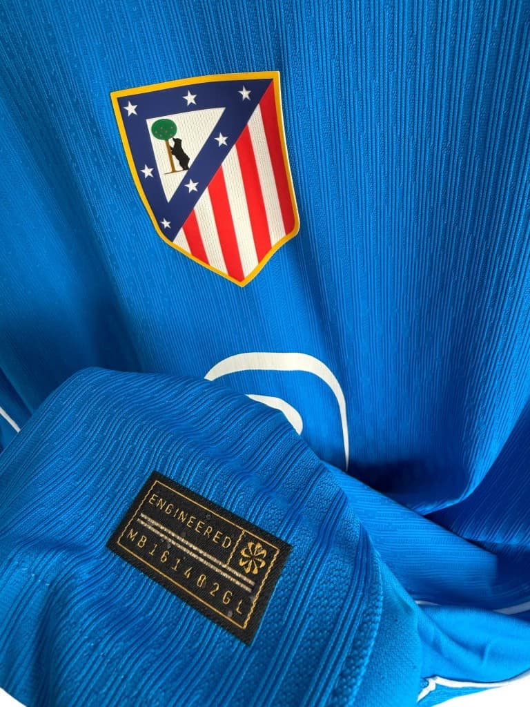 Atlético crest and Nike Engineered authenticity tag