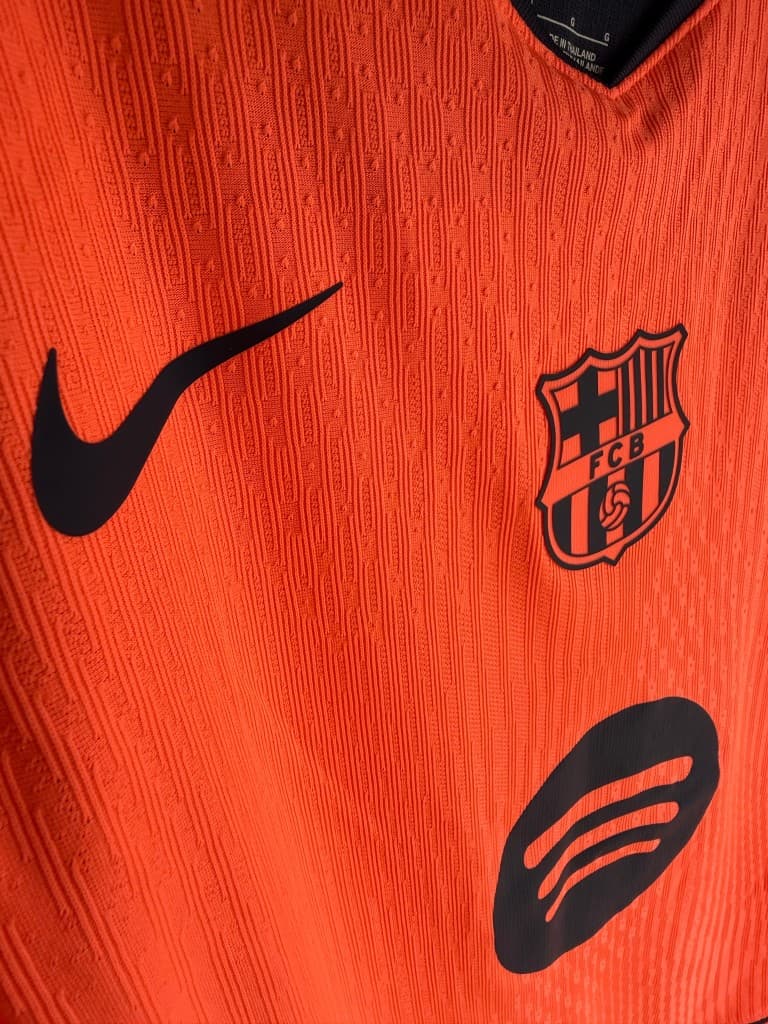 Nike, Spotify and FC Barcelona crest chest detail
